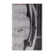 Caja fuerte tipo libro con partitura y violín